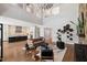 Open-concept living area showcases a stone fireplace and seamless flow into the kitchen at 119 November Dr, Durham, NC 27712