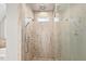 This shower includes multiple shower heads, sleek tile, and a frameless glass door at 119 November Dr, Durham, NC 27712