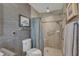 Contemporary bathroom featuring a walk-in shower with a grab bar at 131 Long Shadow Ln, Cary, NC 27518