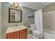 Well-maintained bathroom featuring a classic vanity, an expansive mirror, and a shower/tub combination at 131 Long Shadow Ln, Cary, NC 27518