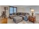 Upstairs living room showcasing a cozy sectional sofa, neutral tones, and a side table with storage at 131 Long Shadow Ln, Cary, NC 27518