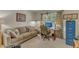Comfortable office space with a desk, sofa, and plenty of natural light at 131 Long Shadow Ln, Cary, NC 27518