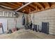 Basement area featuring fitness equipment like a punching bag, weights, and more at 1507 Ridgeway Ave, Durham, NC 27701