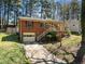Charming brick home with a single-car garage and landscaped front yard at 1507 Ridgeway Ave, Durham, NC 27701