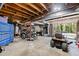 Large garage with exposed wooden beams, a blue toolbox and two motorcycles at 1507 Ridgeway Ave, Durham, NC 27701