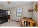 Dining area adjacent to kitchen, with wooden table and vintage feel at 1507 Ridgeway Ave, Durham, NC 27701