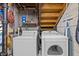 Laundry room with washer and dryer units, offering practical space for laundry tasks at 1507 Ridgeway Ave, Durham, NC 27701