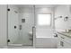 Bathroom showcasing a soaking tub, step-in shower, granite counters and tiled floor at 151 S Harper Faith Way, Benson, NC 27504