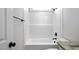 Bright bathroom features white tub with tile walls and a granite vanity at 151 S Harper Faith Way, Benson, NC 27504