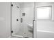 Bathroom boasting a step-in shower, soaking tub, and tiled floor at 151 S Harper Faith Way, Benson, NC 27504