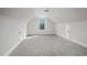 Bonus room with neutral paint and carpet at 151 S Harper Faith Way, Benson, NC 27504