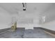 Spacious two-car garage with sealed concrete flooring and brick-lined foundation at 151 S Harper Faith Way, Benson, NC 27504