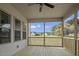 The screened porch has a ceiling fan and overlooks the spacious backyard at 151 S Harper Faith Way, Benson, NC 27504