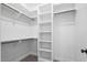 Walk-in closet with shelving and closet rods at 151 S Harper Faith Way, Benson, NC 27504