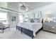 Elegant bedroom with tray ceiling, decorative lighting, and matching nightstands at 1515 Willbrook Dr, Fuquay Varina, NC 27526