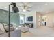 Bonus room featuring stylish decor and large windows, next to the media center and other rooms at 1515 Willbrook Dr, Fuquay Varina, NC 27526