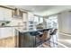Modern kitchen with white cabinetry, stainless steel appliances, and a large island at 1515 Willbrook Dr, Fuquay Varina, NC 27526