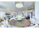 Spacious open-concept living room flowing into the dining area and kitchen with modern finishes at 1515 Willbrook Dr, Fuquay Varina, NC 27526
