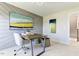 Stylish home office with modern desk, comfortable chair, and artistic wall decor at 1515 Willbrook Dr, Fuquay Varina, NC 27526
