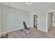 Cozy bedroom features plush carpet, neutral paint, with closet space, perfect for relaxation and comfort at 182 Prince Place Dr, Fuquay Varina, NC 27526
