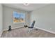 Bright bedroom offers great natural light, plush carpet, and ample space for gym equipment at 182 Prince Place Dr, Fuquay Varina, NC 27526