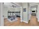 Well-lit home office with hardwood floors and a doorway at 182 Prince Place Dr, Fuquay Varina, NC 27526
