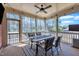 This screened porch is perfect for outdoor entertaining and relaxation, offering serene views at 182 Prince Place Dr, Fuquay Varina, NC 27526
