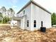 Exterior view of home featuring back porch and backyard at 187 Regis Ln # 10, Coats, NC 27521