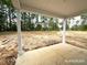 View from back porch showing large lot with lots of trees at 187 Regis Ln # 10, Coats, NC 27521