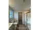 Bathroom featuring a toilet, shower and doorway to closet at 187 Regis Ln # 10, Coats, NC 27521