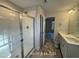 A modern bathroom has a glass enclosed shower and double sink vanity at 187 Regis Ln # 10, Coats, NC 27521