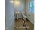 Half bathroom with a pedestal sink at 187 Regis Ln # 10, Coats, NC 27521