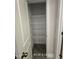The closet is equipped with shelving for organization at 187 Regis Ln # 10, Coats, NC 27521