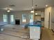 Open-concept kitchen with a granite countertop at 187 Regis Ln # 10, Coats, NC 27521