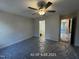 A primary bedroom includes ceiling fan and an ensuite bathroom at 187 Regis Ln # 10, Coats, NC 27521