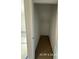 A small pantry provides essential kitchen storage with a shelf at 187 Regis Ln # 10, Coats, NC 27521