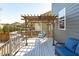 Back deck featuring a pergola with swing, comfortable seating and room for entertaining at 1950 Firenza Dr, Apex, NC 27502