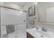 Bathroom featuring a glass-enclosed shower and vanity with modern fixtures at 1950 Firenza Dr, Apex, NC 27502