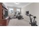 Home gym featuring exercise equipment and ample natural light from the windows at 1950 Firenza Dr, Apex, NC 27502