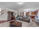 Spacious living area features hardwood floors and plush seating at 1950 Firenza Dr, Apex, NC 27502