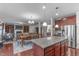 Bright and open concept living space with seamless kitchen and living room layout at 1950 Firenza Dr, Apex, NC 27502