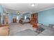 Expansive main bedroom with a large bed, sitting area, and a decorative ceiling fan at 1950 Firenza Dr, Apex, NC 27502