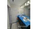 Bathroom features a double sink vanity with modern fixtures and ample counter space at 205 Regis Ln # 11, Coats, NC 27521