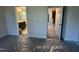Spacious bedroom showing entrance to ensuite bath and hallway at 205 Regis Ln # 11, Coats, NC 27521