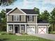 Rendering of a two-story home featuring gray siding, black shutters, a two-car garage, and manicured landscaping at 205 Regis Ln # 11, Coats, NC 27521