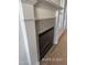 Modern fireplace with decorative surround at 205 Regis Ln # 11, Coats, NC 27521