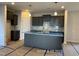 New kitchen with gray cabinets and a central island at 205 Regis Ln # 11, Coats, NC 27521