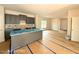 Unfinished kitchen with gray cabinets and a large island, ready for customization at 205 Regis Ln # 11, Coats, NC 27521