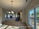 Open living space with fireplace and lots of natural light at 205 Regis Ln # 11, Coats, NC 27521