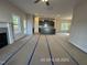 Open concept living and kitchen area with lots of natural light at 205 Regis Ln # 11, Coats, NC 27521